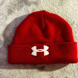 Under Armour maroonish red color. One size fits many
